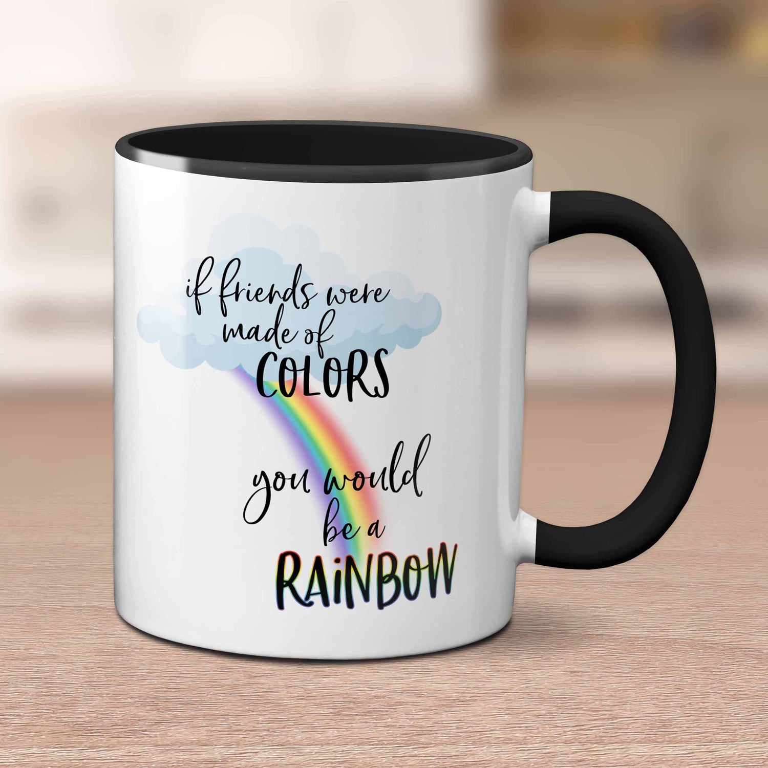 White Mug with blue interior and handle showing a rain cloud with a shining rainbow including the words "you are my rainbow" when it storms"